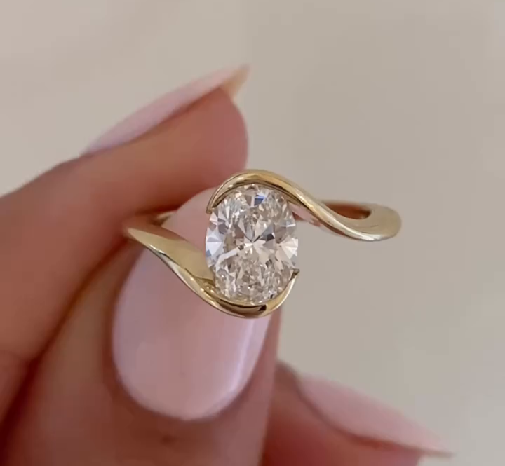 Salome- Swirl Oval Diamond engagement ring